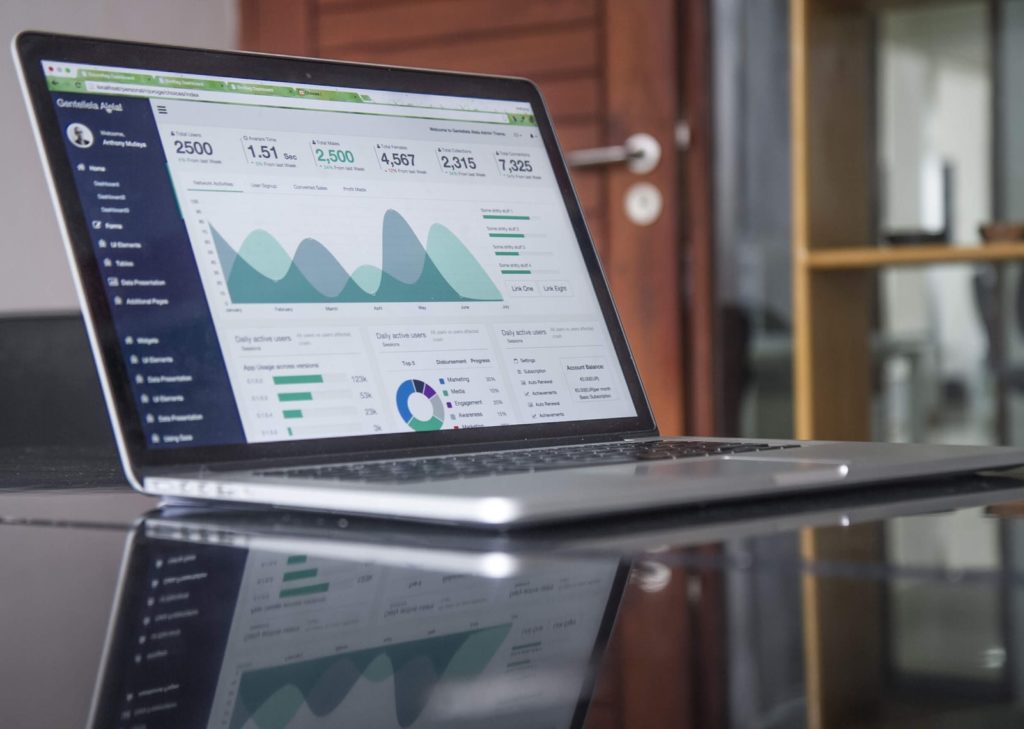 Laptop showing a SaaS revenue dashboard